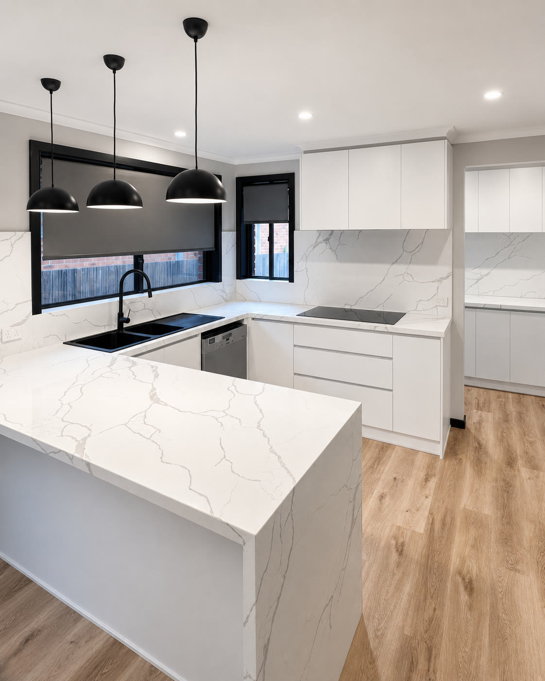 White kitchen with marble waterfall peninsula, Doncaster